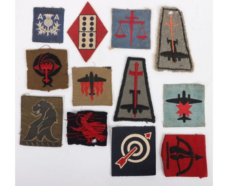 Small quantity of British Army Anti-Aircraft printed, painted, & woven Formation Signs. Lot includes examples of 3rd &12th An