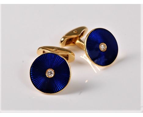 A pair of Faberge cufflinks by Victor Mayer, the blue enamel discs set to centre with a round brilliant cut diamond, stamped 
