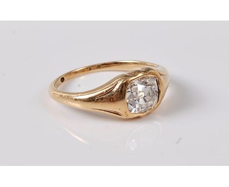 A diamond solitaire ring, the old cushion cut diamond estimated approx. 0.75cts, in a rubover mount with tapered shoulders an