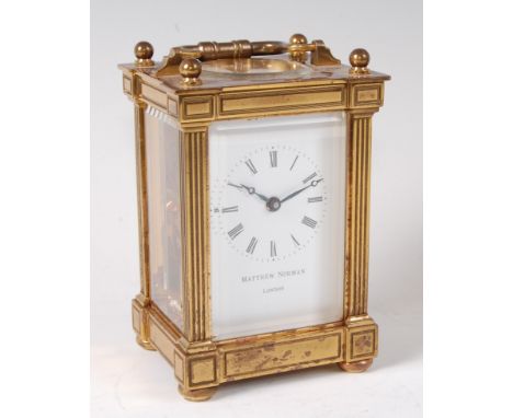 A Matthew Norman lacquered brass cased carriage clock, having a signed white enamel dial, visible platform escapement and sin