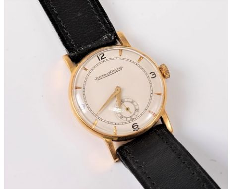 A gents 18ct gold Jaeger LeCoultre wristwatch, circa 1950, having a signed white enamel dial, subsidiary seconds dial, quarte