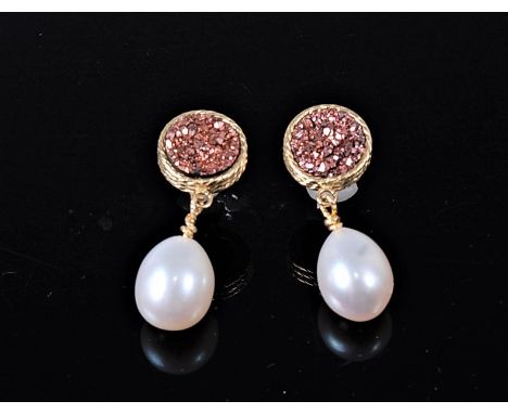A pair of cultured pearl and copper druzy earrings, the oval cultured pearl drops, approx. 11.5mm long, suspended below a dis