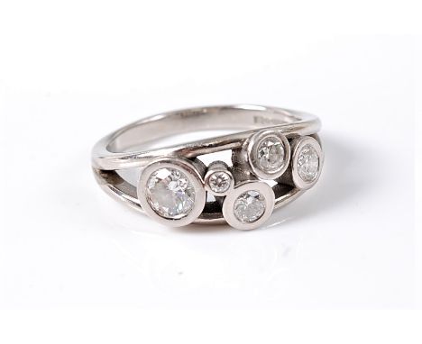 A diamond and palladium dress ring, the five round brilliant cut diamonds, between approx. 0.50 - 0.03cts, total estimated we