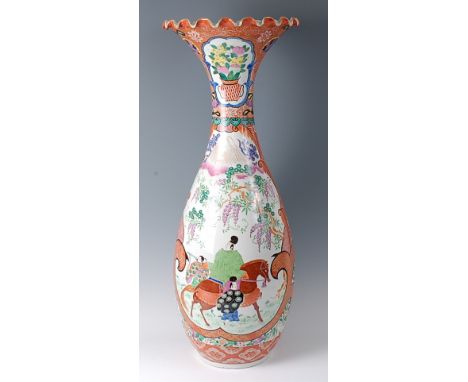 A large Japanese late Meiji period floor vase, having a wavy rim and of mid-baluster form, enamel decorated with figure scene