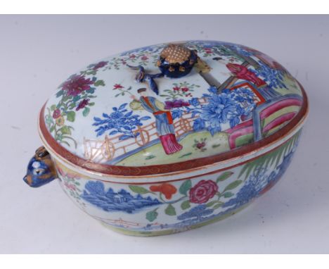 An 18th century Chinese famille rose vegetable tureen and cover, the whole underglaze blue and enamel decorated with figure, 