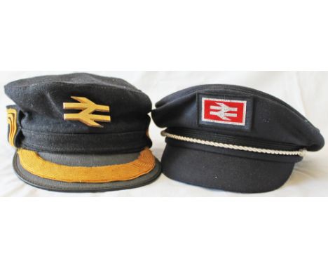 British Rail Hats, 2 different, both having the double arrow logo, one sewn on, the other a gilt clip-on. (2 items) 