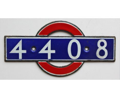 London Underground enamel bullseye from driving car 4408. Measures 5.5in x 2.75in and is in very good condition.