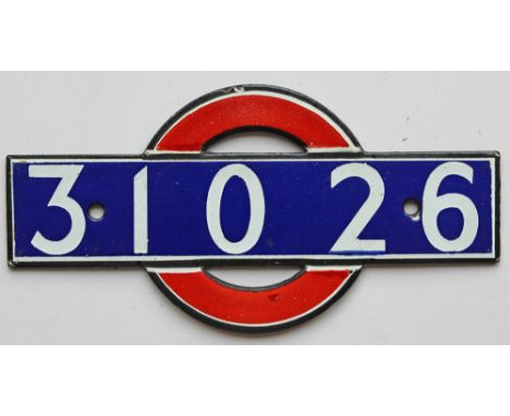 London Underground enamel bullseye from driving car 31026. Measures 5.5in x 2.75in and is in very good condition.