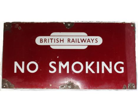 BR(M) enamel sign NO SMOKING showing the totem above. Flangeless mounted on 2 wooden slats. Measures 24in x 12in and has some