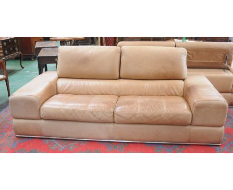 A pale brown leather reception sofa, with adjustable back rests, 'Maxdivani Hand Made in Italy' label, approximate width 236c