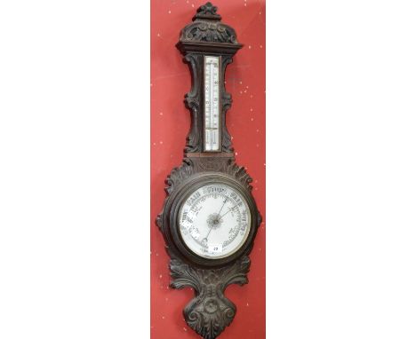 A late Victorian mahogany aneroid wheel barometer, with thermometer, c.1880