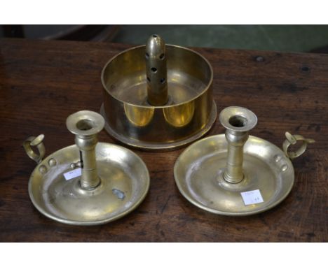 A pair of 19th century brass chamber sticks; a Trench Art brass shell