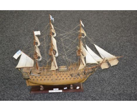 A match stick built model of a three masted battleship HMS Victory, on stand 