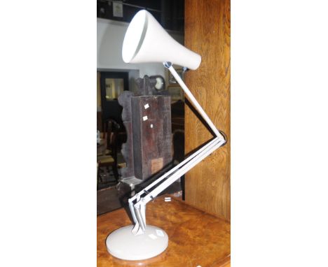A 1970's angle poise lamp, mushroom colour 