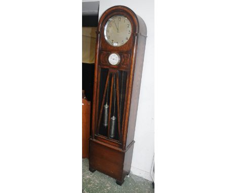 An Art Deco oak dome top longcase clock, Arabic numerals, inset barometer.