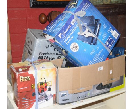 Tools - a deep cut mitre saw;  grinder, tile cutter etc all boxed (5)