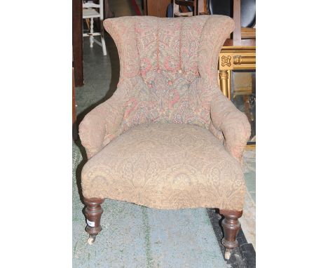 A Victorian mahogany button back armchair, c.1860