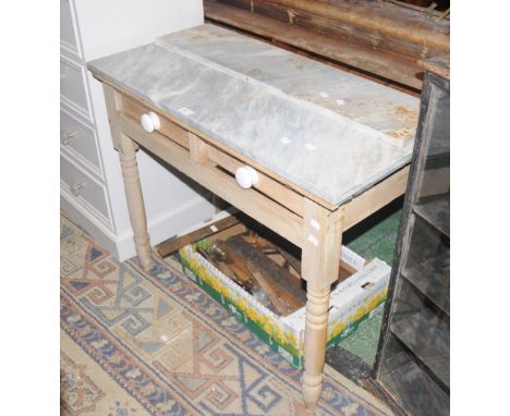 A Victorian pine washstand, grey variegated top and splash back, two short drawers to frieze, ceramic button handles, turned 