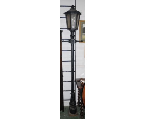 A Victorian style cast iron lamp post.