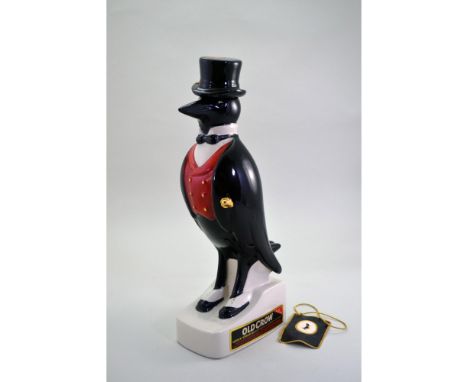 The Old Crow Distillery Co. in Frankfort, KY, distilled and bottled by W.A. Gaines issued The Mr.Penquin with Top Hat. Old Cr