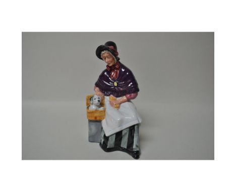 Glazed Porcelain Decorated, Figurine featuring Grandmother with her Dog. Issued: 1981. Hallmark: HN2770. England. Size: 7"h x