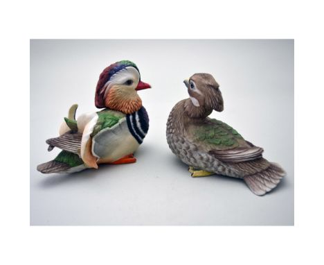 Bisque Porcelain Decorated, hand created, hand painted by the Boehm Artisans, featuring the Mandarin Ducks, Male and Female. 