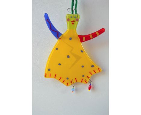 Swirl Girl Fused Art Glass by Bird Brain. Spice up your garden or wall with the Sassy "Swirl Girl" in Yellow. Hand Crafted Fu