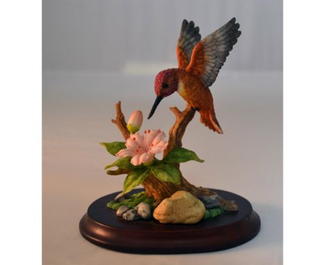 Maruri Presents the Premier Hummingbird Collection featuring the Allen's with Azalea Hummingbird Porcelain Figurine. Issued: 