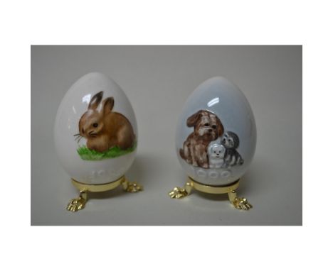 Glazed, Porcelain Decorated, Handpainted Porcelain Egg, 1980, featuring a Rabbit. 1999 Porcelain Egg featuring Puppies, both 