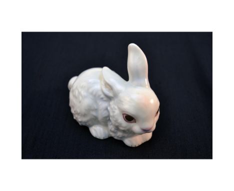 Glazed Porcelain Decorated. Hand created, hand painted by the Goebel Artists in Germany, featuring a Resting Rabbit. Authenti