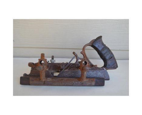 Vintage Tool, Metal Miter Saw with inscription Trade 45 Mark. Size: 6" h x 11"w x 7"d. Artist: ANTIQUE TOOLSIssued: 20TH CDim