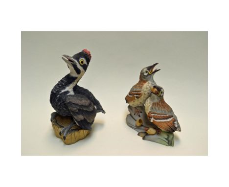 Bisque Porcelain Decorated, hand-created, hand-painted, featuring the Fledgling Pileated Woodpecker, Issued: 1977. Hallmark: 