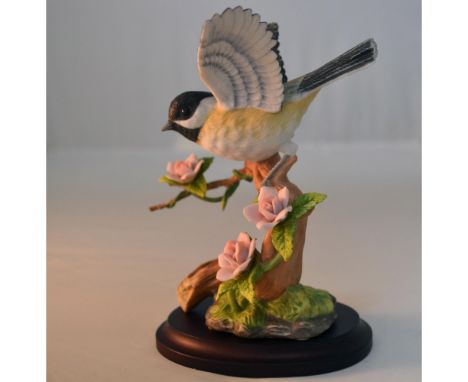 Fine Bisque Porcelain Decorated, hand created, hand painted featuring the Chickadee with Rose Bird Figurine from the Songbird