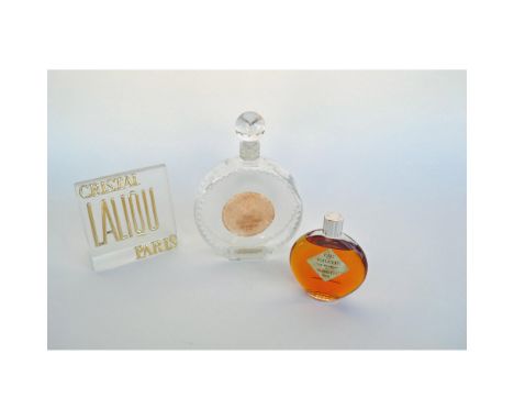 Hand Blown Crystal by Lalique featuring a Large Commissioned Perfume Bottle with a Ball Top, Clear Crystal; a Smaller Lalique