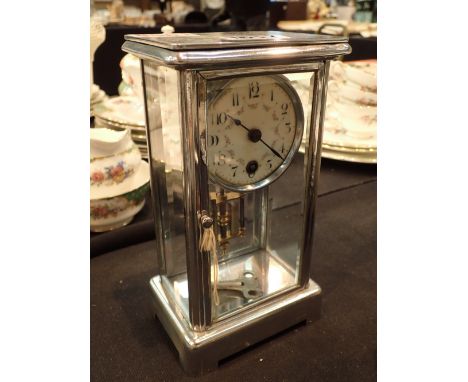 Vintage chromium and glass cased mantel clock with continental movement