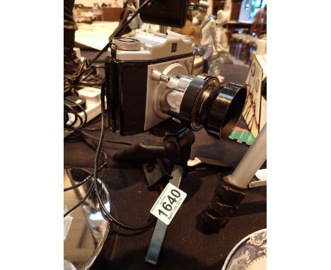 Goldixone camera lamp with tripod  CONDITION REPORT: The electrical items included in this lot have been PAT tested and have 