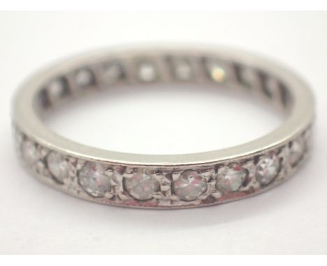 18ct white gold unmarked diamond eternity ring approximately 0.3ct diamonds size N