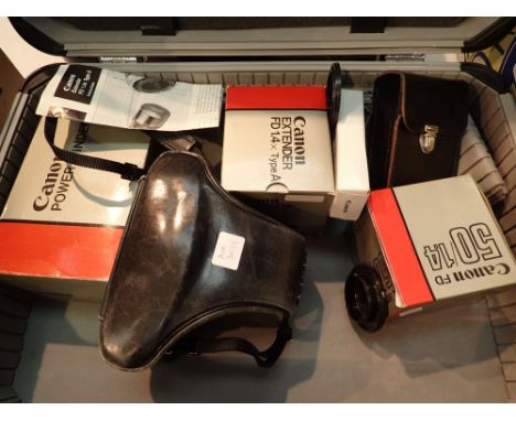 Canon F1 film camera a Canon FD 50mm 1:1.4 an ER case and power winder and a FD 1.4X extender lens