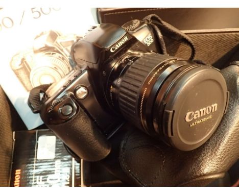 Canon EOS 500 film camera body and Canon EF 28-80 1:3.5-5.6 II lens and Canon EF 50mm f/1.8 lens
