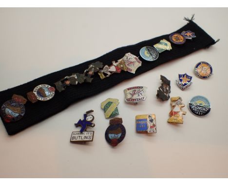Box of metal and enamel vintage Butlins pin badges