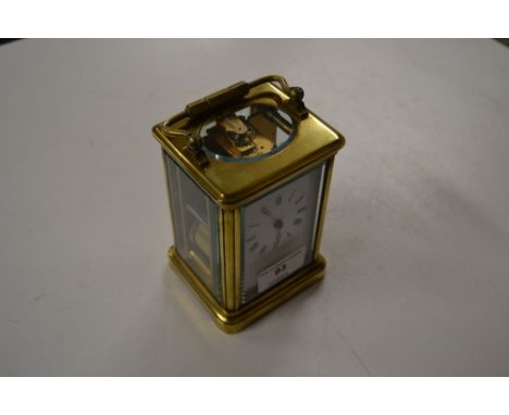 A brass cased carriage clock with key 