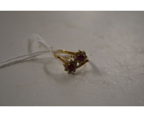 A 14ct gold ruby and cubic zirconia dress ring