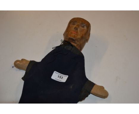 A Folk Art style carved wooden puppet