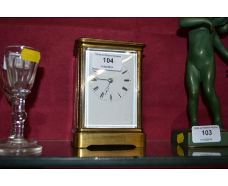 A brass cased carriage clock