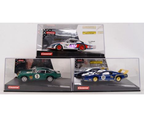 A collection of 3x original contemporary 1/32 scale Carrera Evolution plastic racing slot cars to include; 27152 Porsche 935/