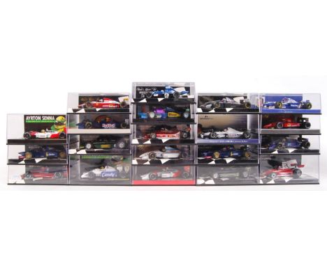 A large collection of 20x original 1/43 scale Minichamps diecast model F1 Formula One racing cars. Mint. All within their ori
