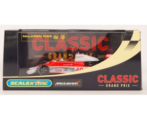 An original contemporary Scalextric 'Classic Grand Prix' 1/32 scale C2800 McLaren M23 No40 plastic racing slot car. Within it