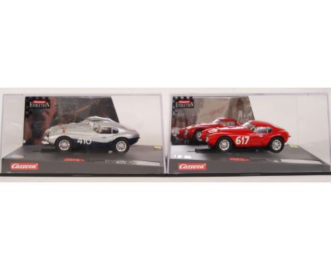 A collection of 2x original contemporary 1/32 scale Carrera Evolution plastic slot cars to include; 25711 Ferrari Uovo & 2571