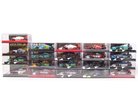 A large collection of 20x original 1/43 scale Minichamps diecast model F1 Formula One racing cars. Mint. All within their ori
