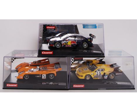 A collection of 3x original contemporary Carrera Evolution 1/32 scale plastic racing slot cars to include; 27237 Audi A4 DTM,